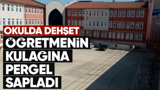 Öğretmenin kulağına pergel sapladı