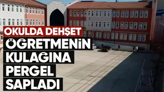 Öğretmenin kulağına pergel sapladı