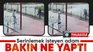 Oto yıkamacıda üzerine su tutturdu