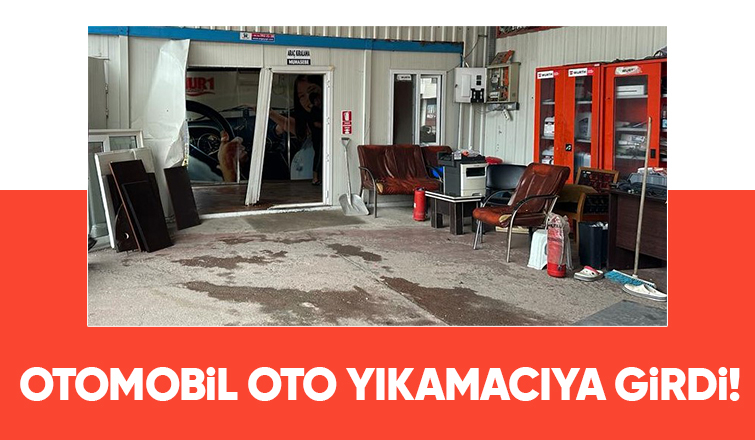 Oto yıkamada kaza: Otomobil iş yerine girdi