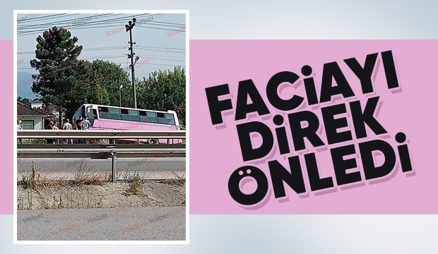 Otobüsün devrilmesini direk önledi