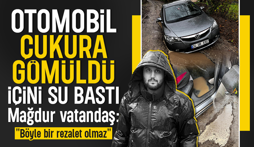 Otomobil dev çukura gömüldü