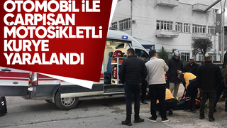 Otomobil ile motosikletli kurye çarpıştı