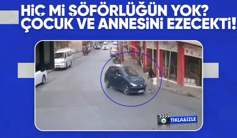 Otomobil sürücüsü az kalsın anne ve çocuğunu eziyordu