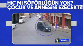 Otomobil sürücüsü az kalsın anne ve çocuğunu eziyordu