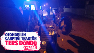 Otomobilin çarptığı traktör ters döndü