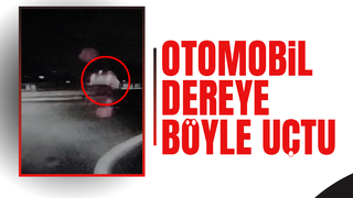 Otomobilin dereye uçtuğu kaza anı kamerada