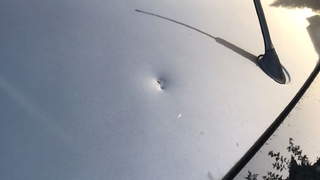 Park halindeki araca yorgun mermi isabet etti