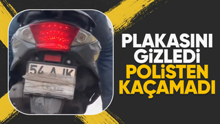 Plakasını gizleyen motosikletli yakalandı