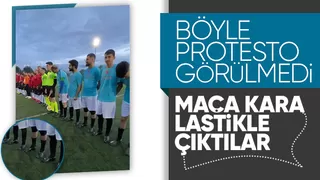 Protesto için sahaya kara lastikle çıktılar