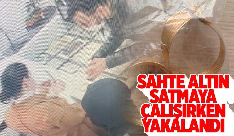 Sahte altını satmak istedi, enselendi