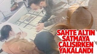 Sahte altını satmak istedi, enselendi