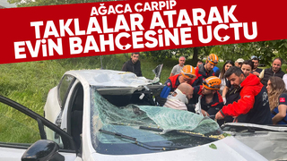 Sapanca'da taklalar atan otomobil evin bahçesine uçtu