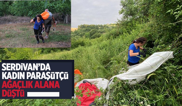 Serdivan'da kadın paraşütçü ağaçlık alana çakıldı