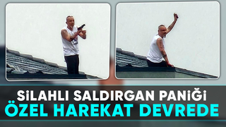 Silahla çatıya çıkıp ateş açtı