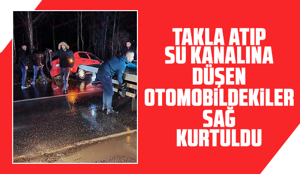 Su kanalına takla atan otomobildekiler yara almadı