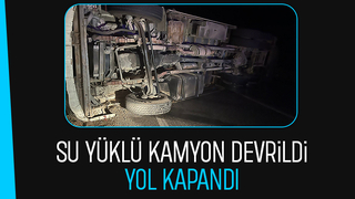 Su yüklü kamyon yan yattı sürücü yaralandı