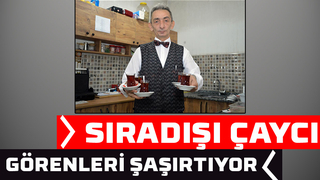 Takım elbiseli papyonlu çayçı