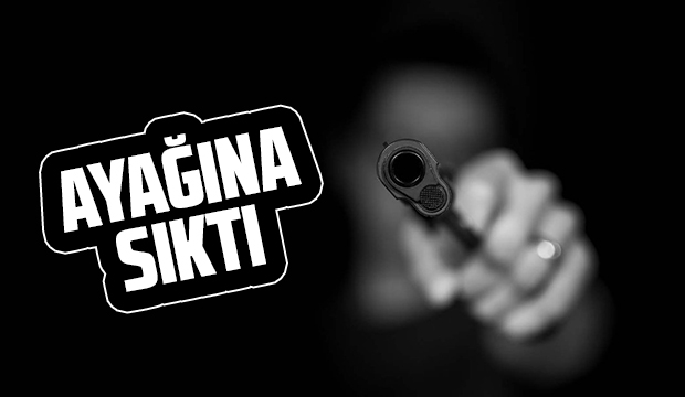Tartıştığı şahsı ayağından silahla vurdu