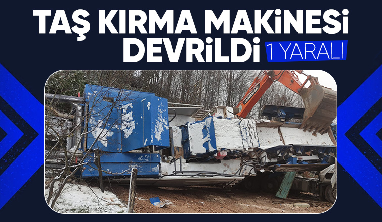 Taş kırma makinesi tırın üzerine devrildi