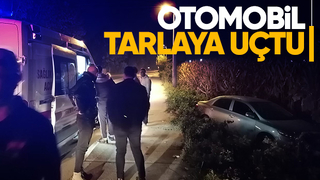 Tarlaya uçan otomobilde sürücü yaralandı