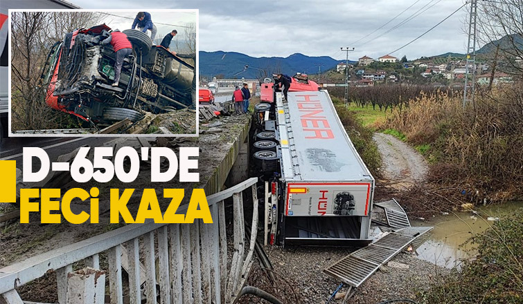 Tır bariyerleri aşarak devrildi