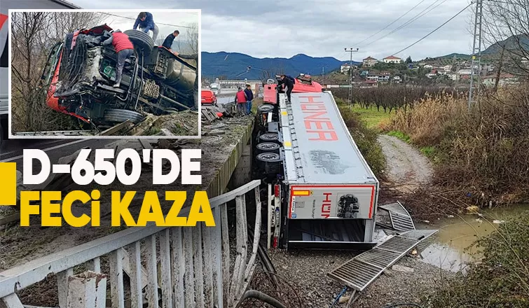 Tır bariyerleri aşarak devrildi
