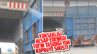 TIR'ın taşıdığı yük köprüye sıkıştı