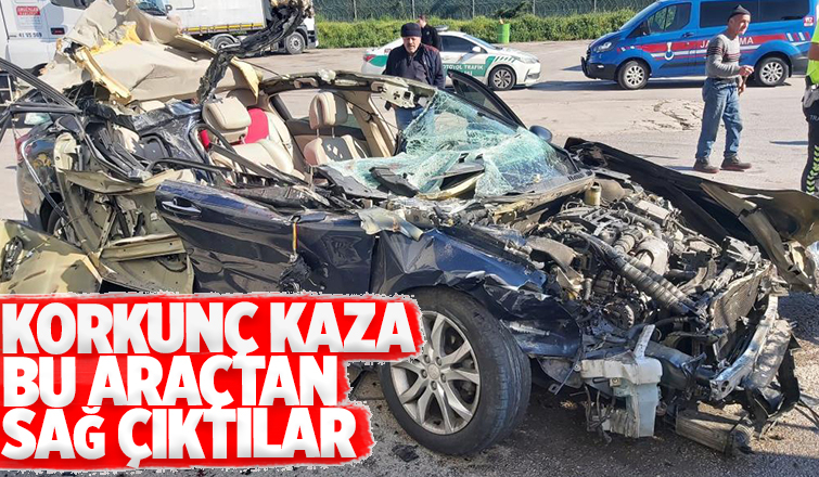 Tıra ok gibi saplanan otomobilden sağ kurtuldular