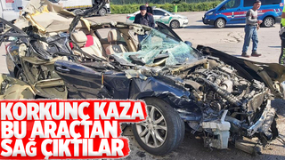 Tıra ok gibi saplanan otomobilden sağ kurtuldular