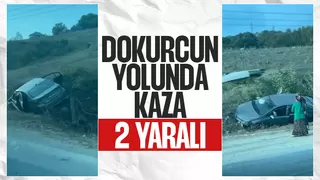 Toprak alana çarpan otomobildeki 2 kişi yaralandı