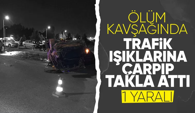 Trafik ışıklarına çarpıp takla attı