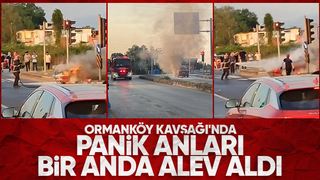 Trafik ışıklarında duran otomobil yandı