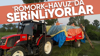 Traktör römorkunda serinliyorlar