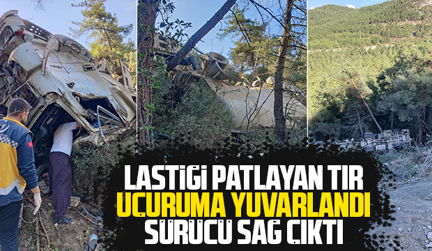 Uçuruma yuvarlanan tırın sürücüsü yaralı kurtuldu