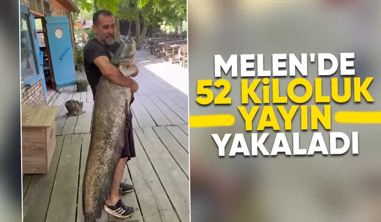 Yakaladığı dev balıkla poz verdi