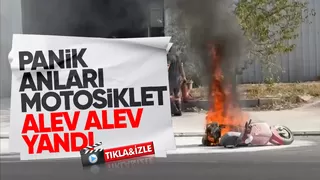 Yanan motosiklete söndürme tüpleri ile müdahale