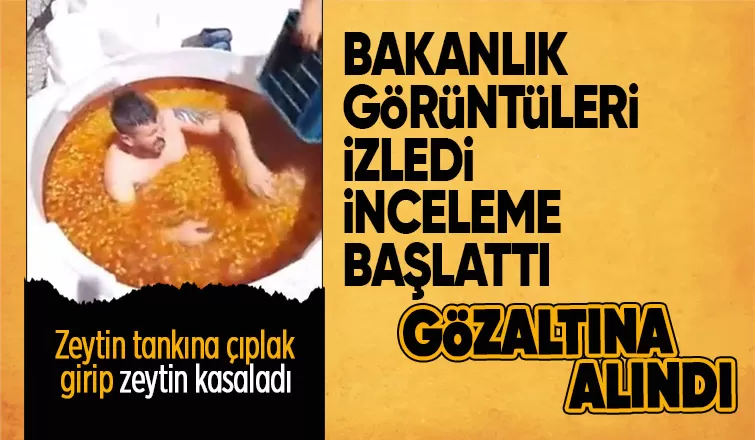 Zeytin tankına çıplak giren işçi