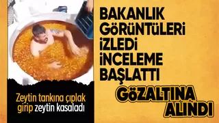 Zeytin tankına çıplak giren işçi